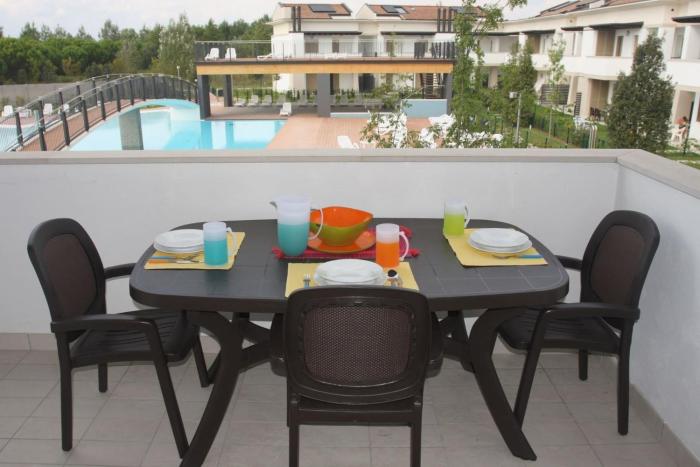 Comfy apartment with shared pool