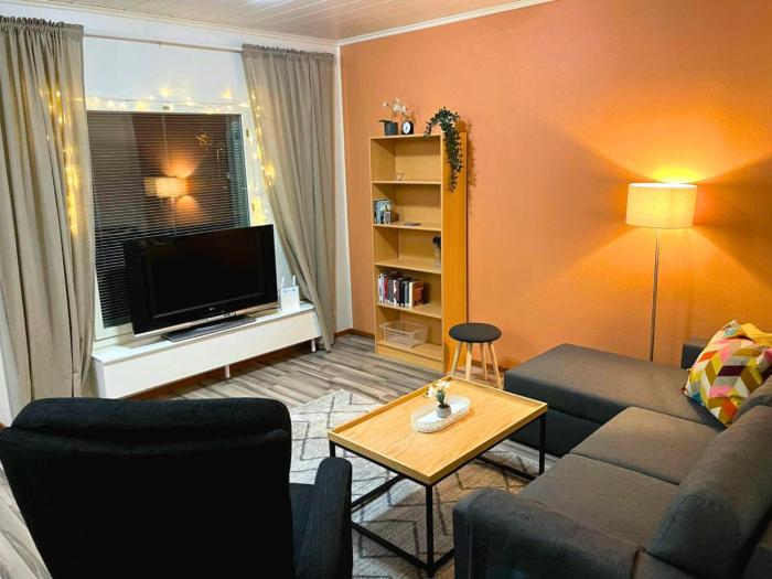 A one-bedroom apartment with a sauna near the center