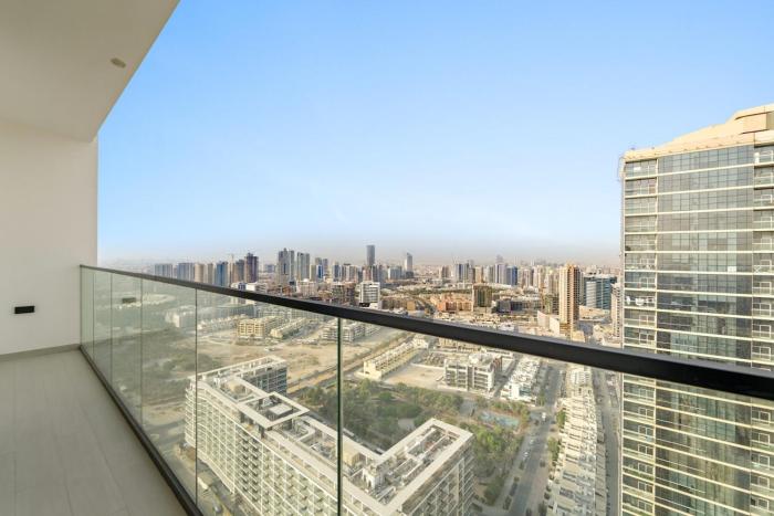 Stylish 2BR JVC with Pool, Gym Access, and City Skyline Views