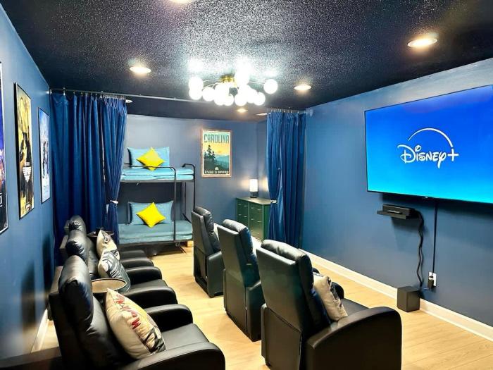 Theater and game rooms 5 bedrooms 2 king size beds TikTok and social media wall