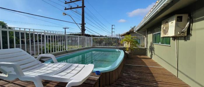 Casa com 8 suítes para família e amigos na praia