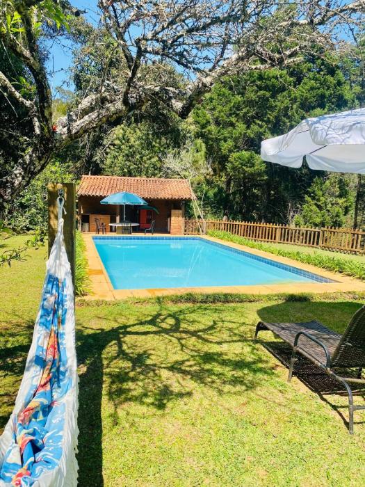 Oásis Serrano com piscina e lareira