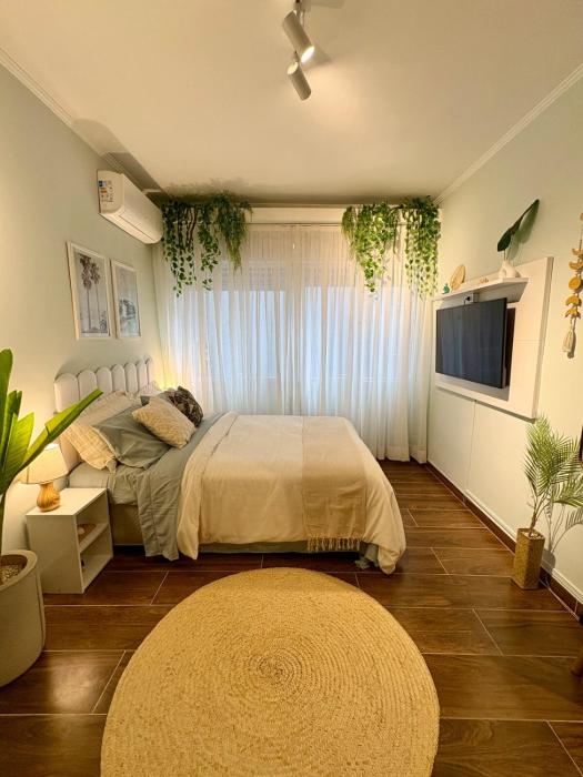 Beira-mar - Apt aconchegante com ar e Wi-Fi