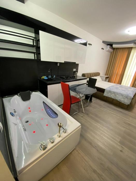 LUX HOT TUB IN BEST TOWEr