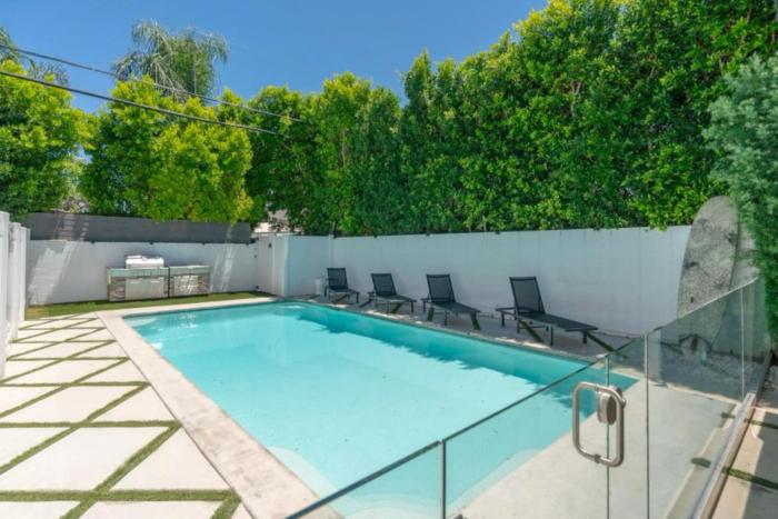 Modern Encino Retreat with pool, lush yard and comfort