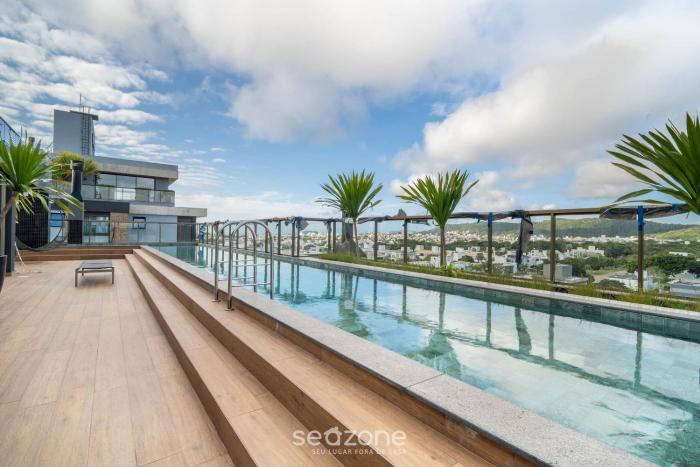 Apto c varanda e churrasqueira em Jurerê IHD0101