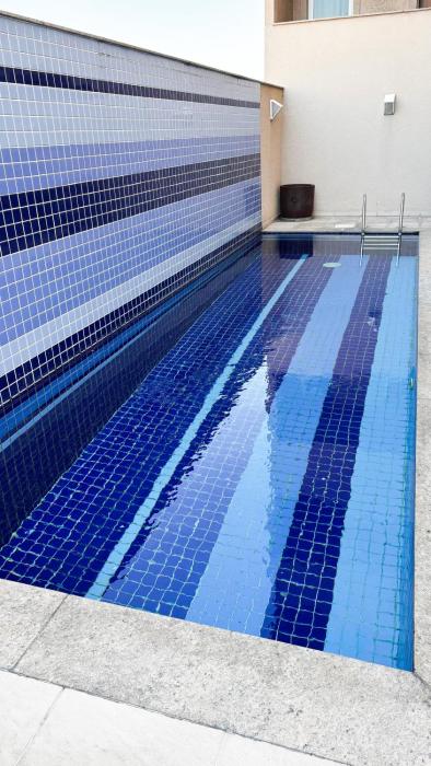 Studio com piscina e ar - 15 minutos do Galeão