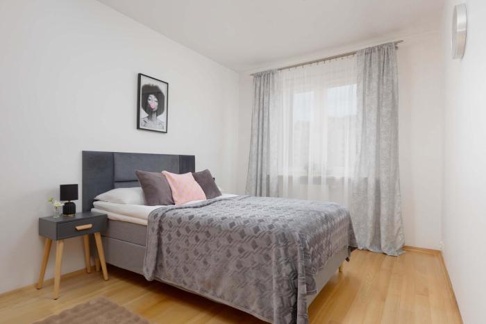 Wooden Apartment Bellottiego Warsaw with Parking by Noclegi Renters