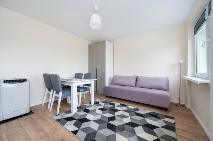 Manufaktura Comfort Stay Apartment by BookingHost