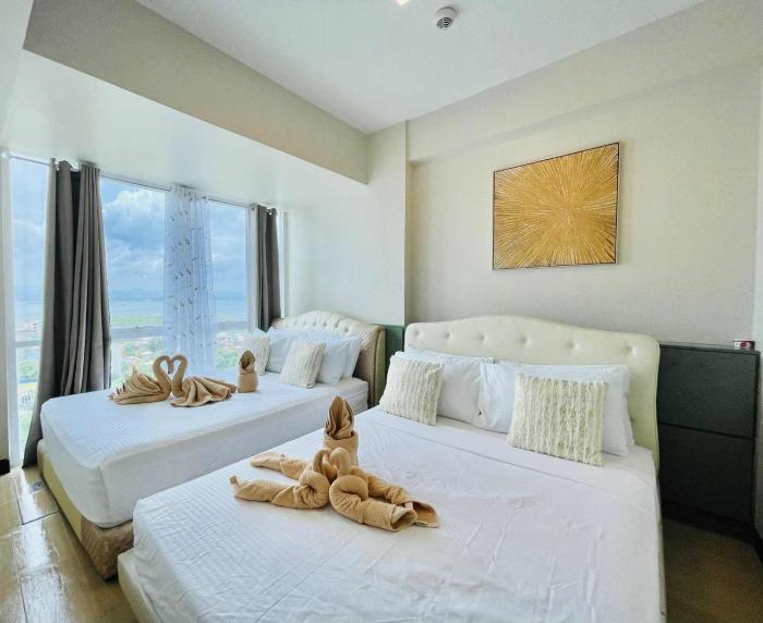 Heart of Mactan Newtown big space with free wifi and pool access