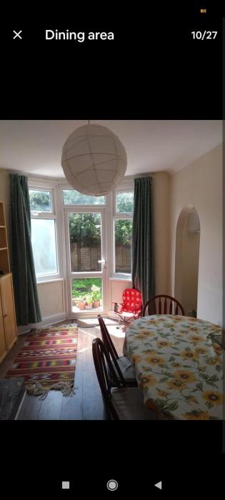 Victorian house in front of a park