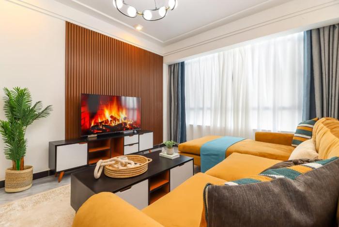 Comfort living two bedroom apartment with fully equipped gym heated swimming pool private parking space,child play area and amazing scenic views