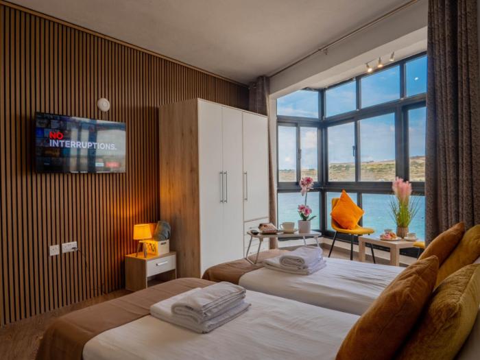 Sunny Beach House with Jacuzzi - Steps from the Sea