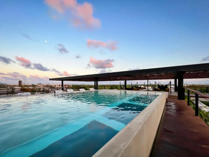 Gated 2BR apartment with rooftop pool