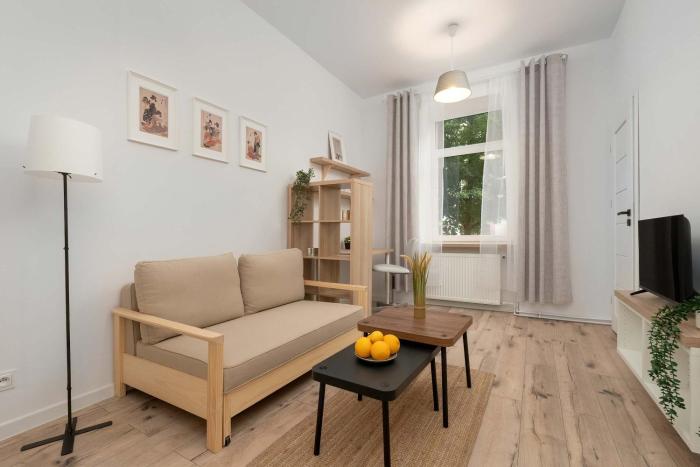 Beige Apartment Near Łódź Fabryczna Perfect for Remote Work by Noclegi Renters