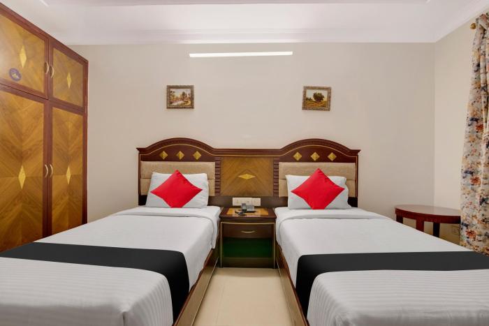 Capital O Elegant Amethyst Business Hotel Near Ragigudda Sri Prasanna Anjaneyaswamy Temple