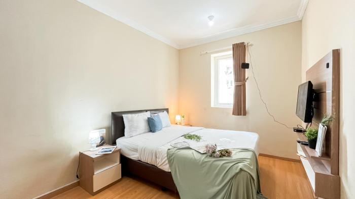 Spacious 2BR with Working Room at Grand Palace Kemayoran Apartment By Travelio