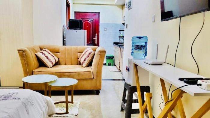 Royal essence apartment with swimming pool ,ample parking ,fully equipped gym, child playground and amazing scenic city view