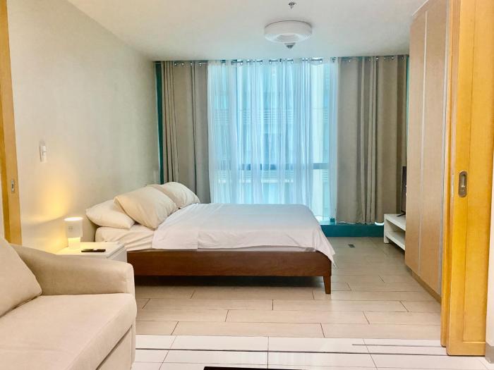 One Uptown Residence BGC 1BR sofabed