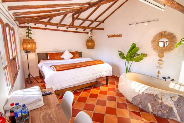 Exclusiva cabaña con tina en piedra, fogata y cine