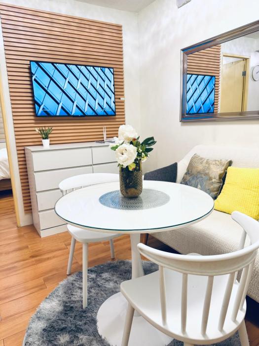 Modern Cozy 2BR Smart Lock Condo with Netflix 4K and YouTube Premium at Seawind