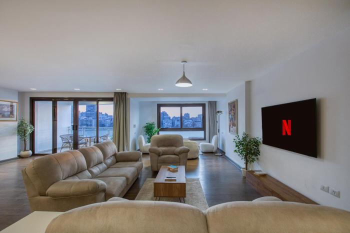 Luxury Living with Full Nile Views New 4BR Gem Arkadia