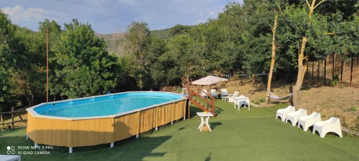 DIMORA IL CAMALEONTE country apartments with pool