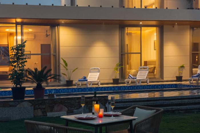 SaffronStays Raaga - luxury 4BR villa with private pool, lawns, gazebos & sweeping Aravalli hill views