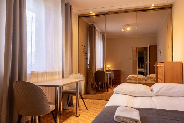 Spacious Apartment with a Balcony in Bielany