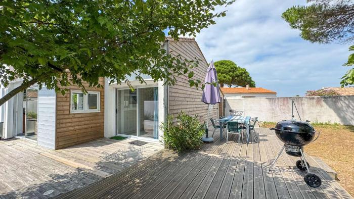 Jolie villa de plain-pied avec jardin et parking