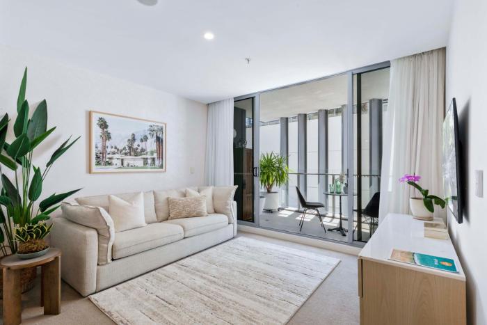 Poolside at 28 Luxe Newstead Apartment Work-Relax-Play