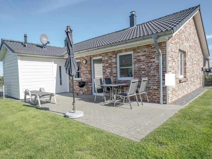 Ferienhaus Charlie mit Terrasse und Kamin