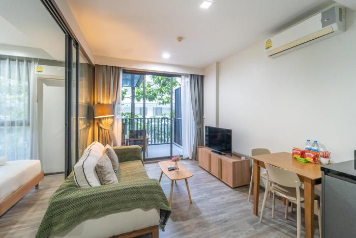 Elegant 1BR Garden-View Condo - The Deck Patong