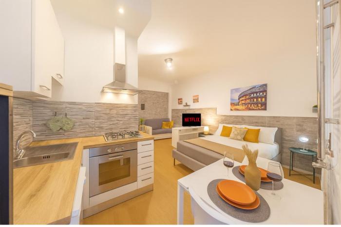 Appartamento Moderno a due passi dal Colosseo a 5 Minuti dalla Metro A