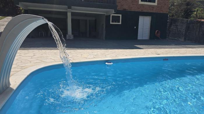 Quartos Refúgio com Vista e Piscina Compartilhada