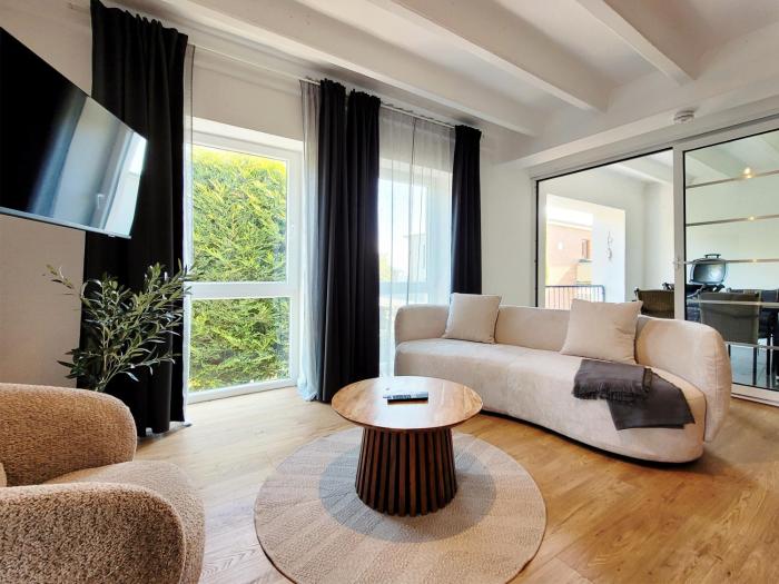 Charmante Ferienwohnung mit Terrasse - nur 50m zum Strand mit eigenem Parkplatz und Fahrradunterstellmöglichkeit