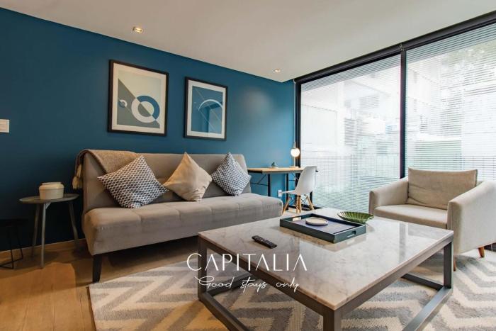 Capitalia Chic 1BR Comfort in Prime Location