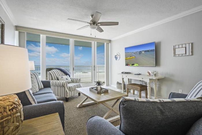 New listing! Direct oceanfront condo with a balcony, heated pool, and tennis court