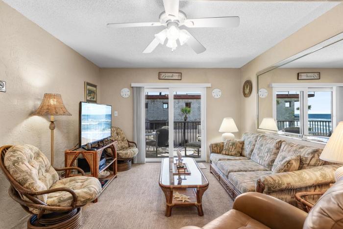 209 - Comfortable condo with view of pool and ocean