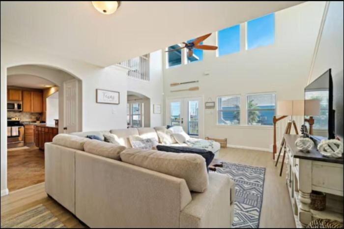 Beach house with large deck and patio