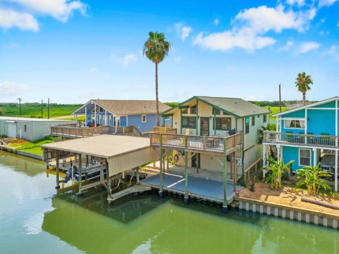 Waterfront beach house with the ultimate game room and two docks