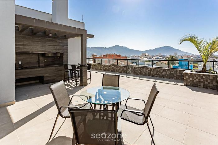 Estadia completa em prédio com piscina a 850m da praia em Florianópolis - STIs