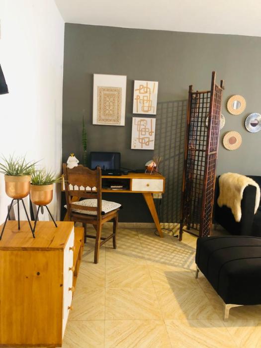 Departamento con cochera terraza y asador