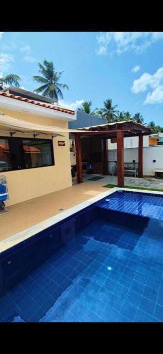 Casa recém construída + piscina, próxima da praia