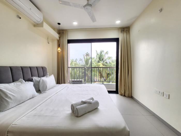Peaceful Candolim 2BHK Apartment - Family Stay, Scenic View, Pool