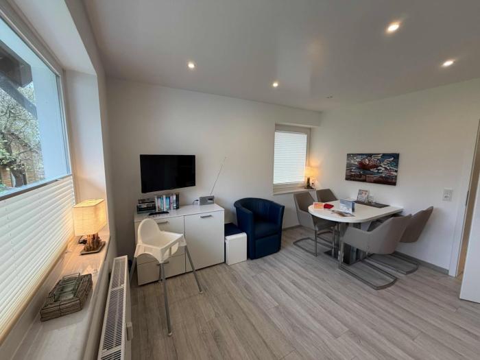 Haus Iris Dünenwind - Ferienwohnung mit Blick ins Grüne