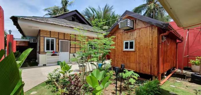 Modernong Bahay Kubo na may gitnang mainit at malamig na shower