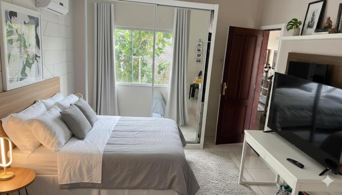 Suítes Privativas Confortáveis