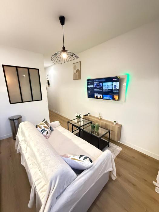 Séjour lumineux et moderne aux portes de Paris