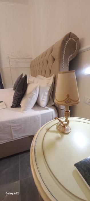 PALAZZO NOVECENTO Centro Storico Rooms & Wellness